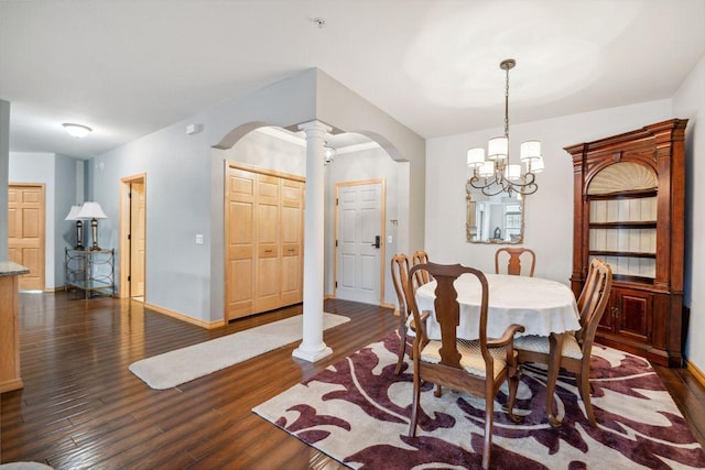 1700 Metro Blvd Unit 210, Edina, MN 55439 - dining space featuring arched walkways, dark wood-type flooring, and a chandelier