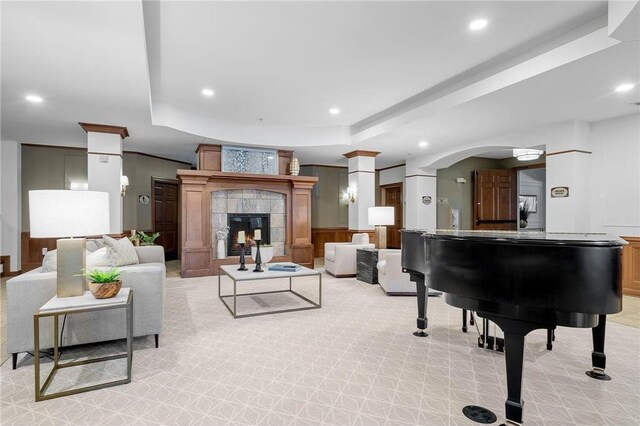1700 Metro Blvd Unit 210, Edina, MN 55439 - living room with a raised ceiling, light colored carpet, recessed lighting, a tile fireplace, and ornate columns