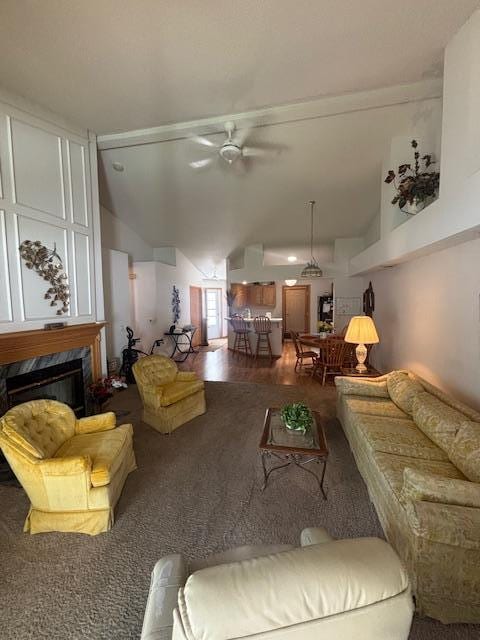 9257 Prairieview Trl N, Champlin, MN 55316 - living room featuring a ceiling fan, a fireplace, and high vaulted ceiling
