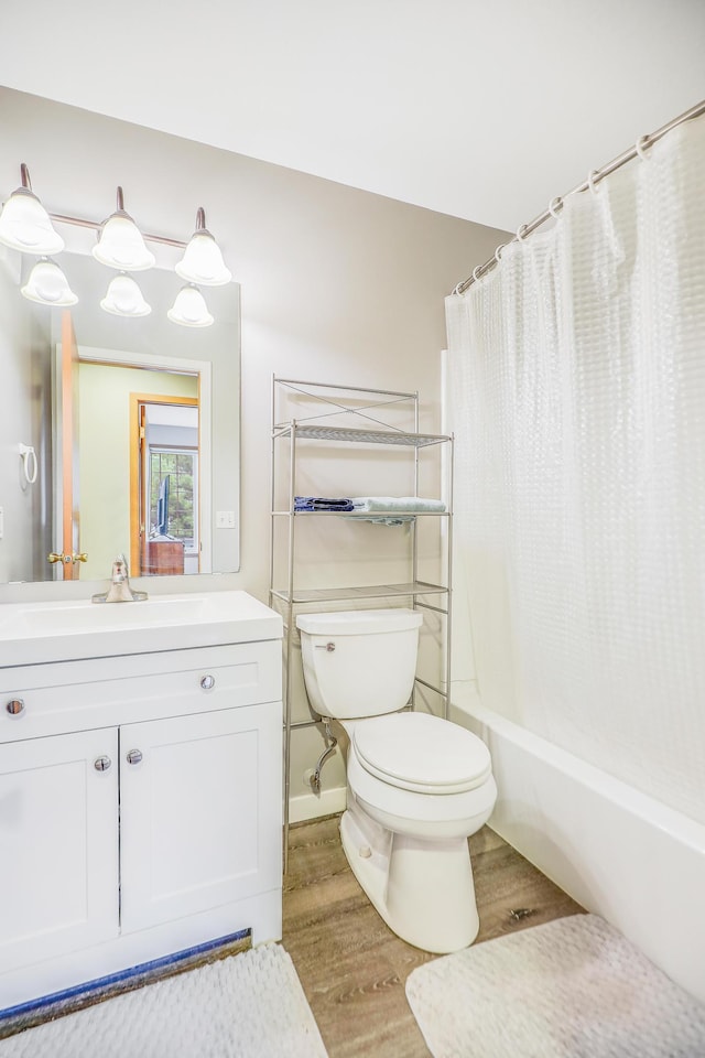 15521 Foghorn Ln, Apple Valley, MN 55124 - full bath with wood finished floors, vanity, and shower / bath combination with curtain