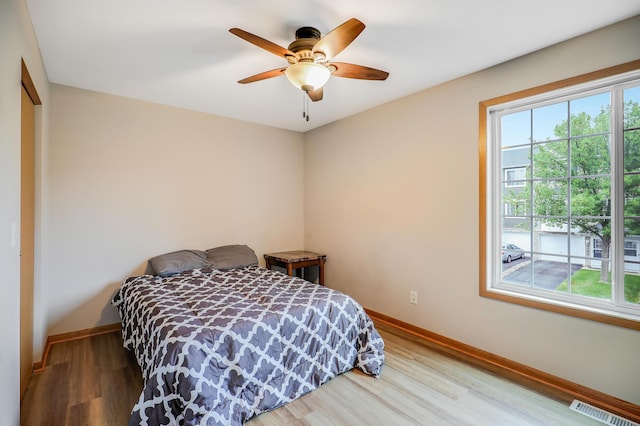 15521 Foghorn Ln, Apple Valley, MN 55124 - bedroom with wood finished floors, a closet, and ceiling fan