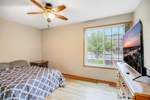 15521 Foghorn Ln, Apple Valley, MN 55124 - bedroom with light wood-style floors and ceiling fan