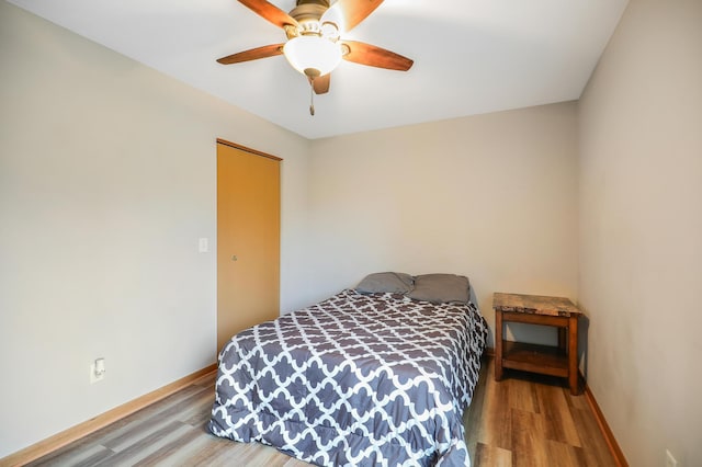 15521 Foghorn Ln, Apple Valley, MN 55124 - bedroom featuring wood finished floors and ceiling fan