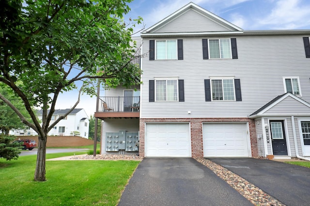 15521 Foghorn Ln, Apple Valley, MN 55124 - multi unit property featuring driveway, brick siding, an attached garage, and a front lawn