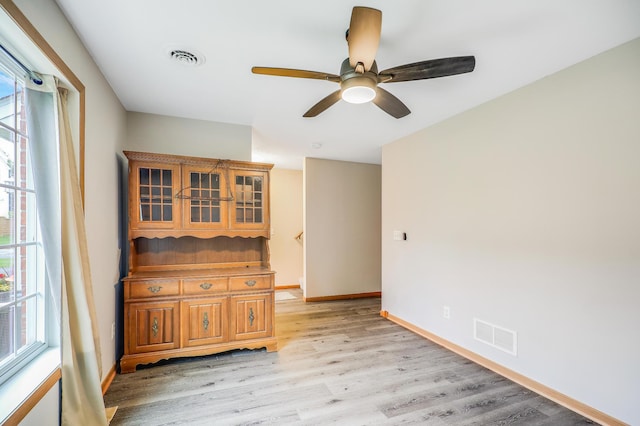 15521 Foghorn Ln, Apple Valley, MN 55124 - empty room featuring light wood-style flooring and a ceiling fan