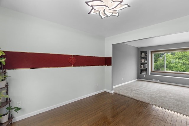 4990 148th Path W, Apple Valley, MN 55124 - spare room with wood finished floors and a chandelier