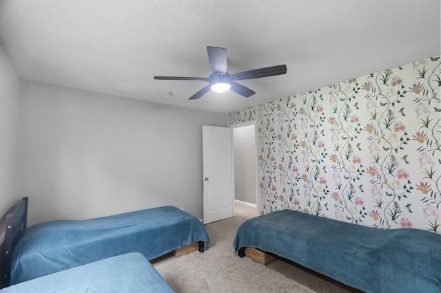 4990 148th Path W, Apple Valley, MN 55124 - carpeted bedroom featuring a ceiling fan and baseboards