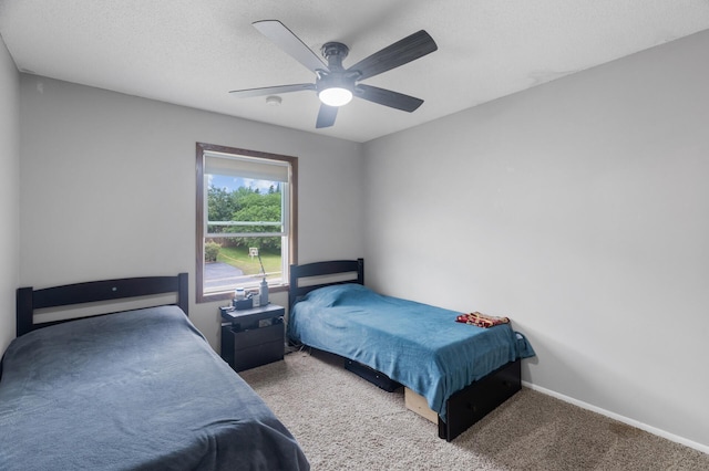 4990 148th Path W, Apple Valley, MN 55124 - carpeted bedroom featuring a ceiling fan and baseboards