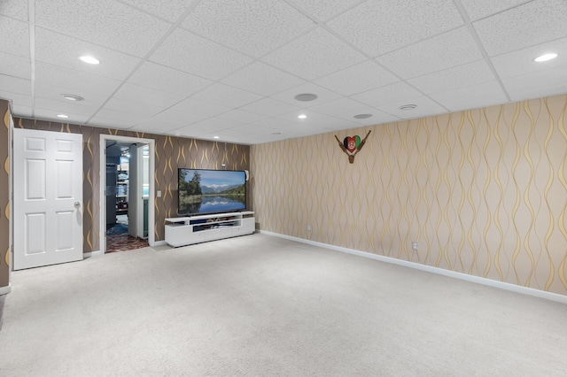 4990 148th Path W, Apple Valley, MN 55124 - unfurnished living room featuring carpet, a drop ceiling, recessed lighting, and wood walls