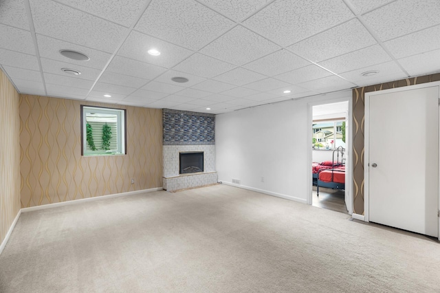 4990 148th Path W, Apple Valley, MN 55124 - unfurnished living room with a fireplace, carpet, healthy amount of natural light, a paneled ceiling, and recessed lighting