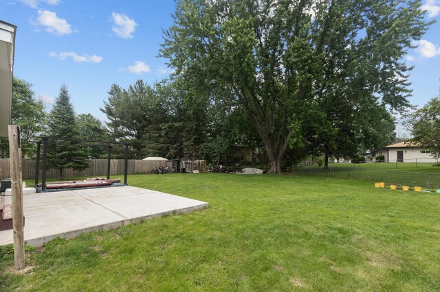 4990 148th Path W, Apple Valley, MN 55124 - fenced backyard featuring a patio