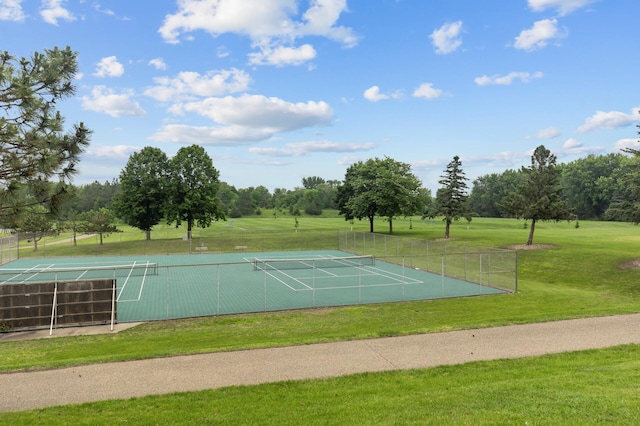 4990 148th Path W, Apple Valley, MN 55124 - view of community with a tennis court and view of wooded area