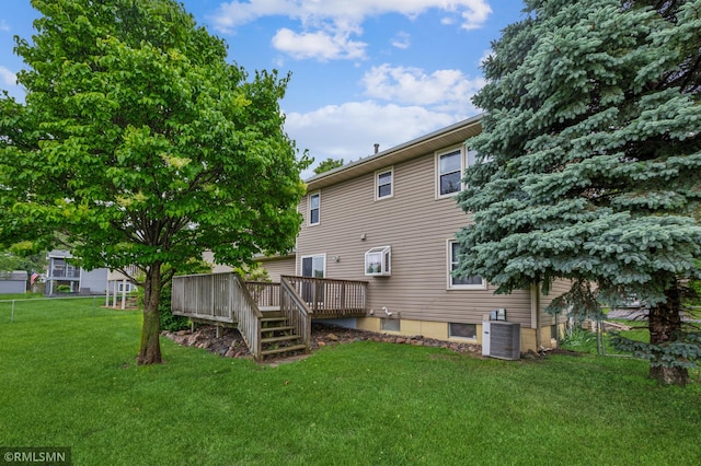 7216 Vinewood Ln N, Maple Grove, MN 55311 - back of property featuring a wooden deck and a yard