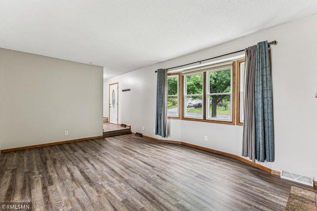 7216 Vinewood Ln N, Maple Grove, MN 55311 - unfurnished room with wood finished floors
