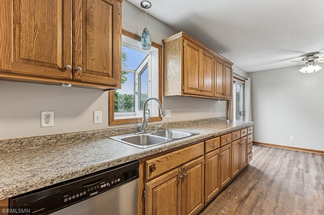 7216 Vinewood Ln N, Maple Grove, MN 55311 - kitchen with stainless steel dishwasher, dark wood finished floors, brown cabinetry, a textured ceiling, and a ceiling fan