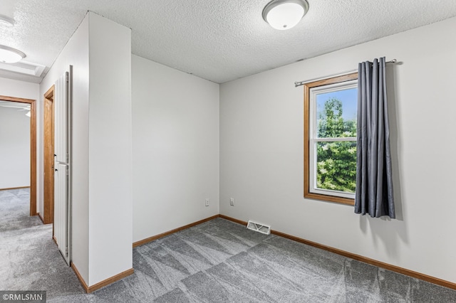 7216 Vinewood Ln N, Maple Grove, MN 55311 - carpeted spare room with a textured ceiling and baseboards