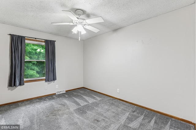 7216 Vinewood Ln N, Maple Grove, MN 55311 - carpeted empty room with a textured ceiling and ceiling fan