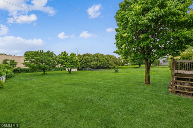 7216 Vinewood Ln N, Maple Grove, MN 55311 - view of yard with a wooden deck