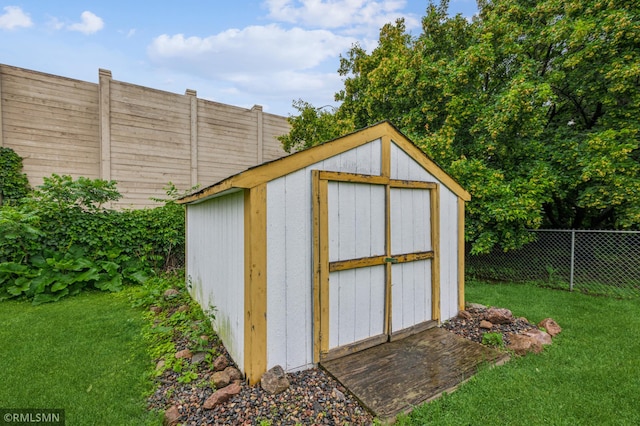 7216 Vinewood Ln N, Maple Grove, MN 55311 - view of shed with a fenced backyard