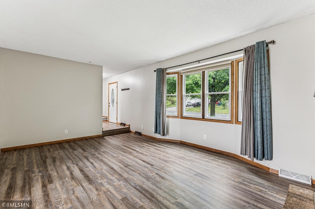 7216 Vinewood Ln N, Maple Grove, MN 55311 - unfurnished room with wood finished floors