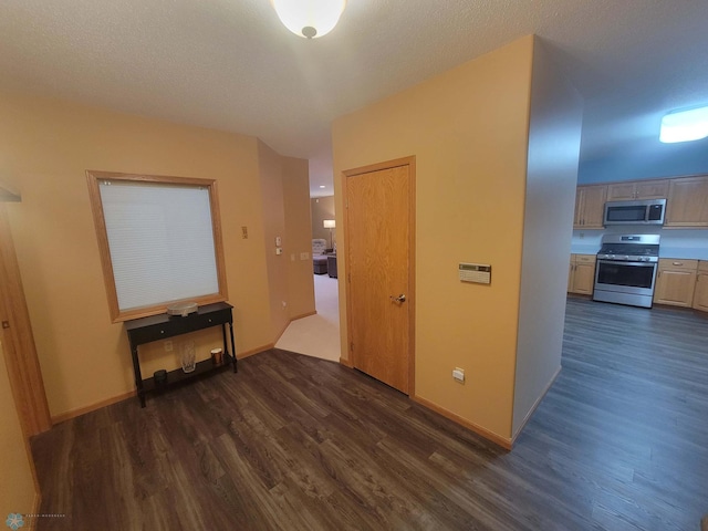 2501 30th Ave S Unit 109, Fargo, ND 58103 - corridor with dark wood-style floors and baseboards