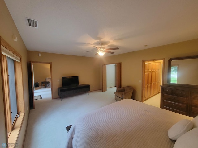 2501 30th Ave S Unit 109, Fargo, ND 58103 - bedroom featuring light carpet and ceiling fan