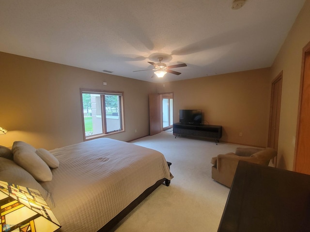 2501 30th Ave S Unit 109, Fargo, ND 58103 - bedroom with light colored carpet and a ceiling fan