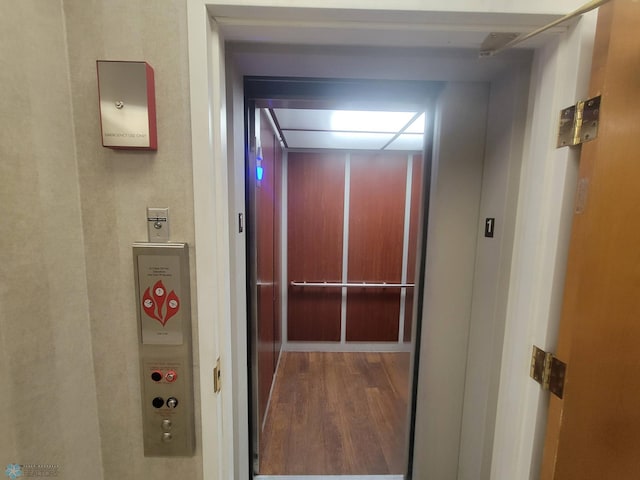 2501 30th Ave S Unit 109, Fargo, ND 58103 - hallway featuring wood finished floors and elevator
