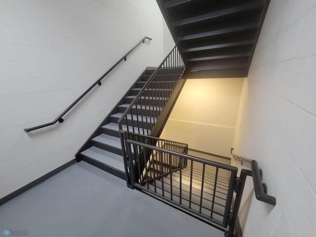 2501 30th Ave S Unit 109, Fargo, ND 58103 - stairs featuring finished concrete floors