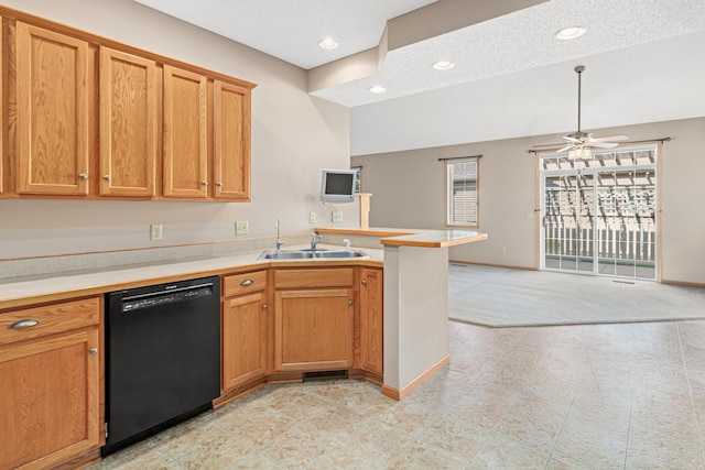 42 Pullman Ave, Saint Paul Park, MN 55071 - kitchen featuring black dishwasher, light colored carpet, a peninsula, light countertops, and a ceiling fan