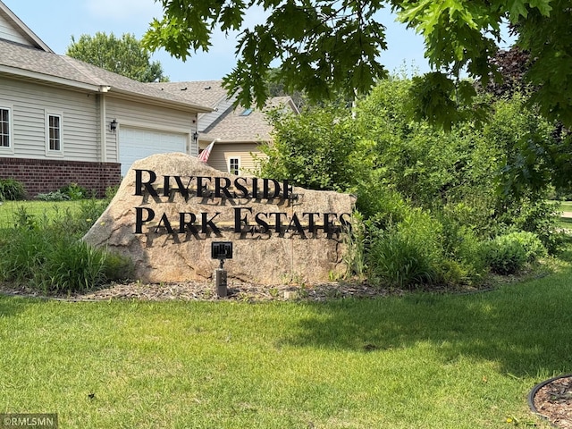 42 Pullman Ave, Saint Paul Park, MN 55071 - community / neighborhood sign featuring an attached garage and a lawn