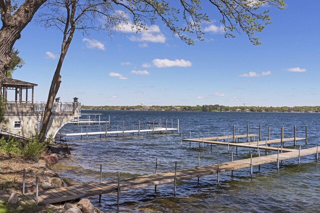 17950 Breezy Point Rd, Woodland, MN 55391 - dock featuring a water view