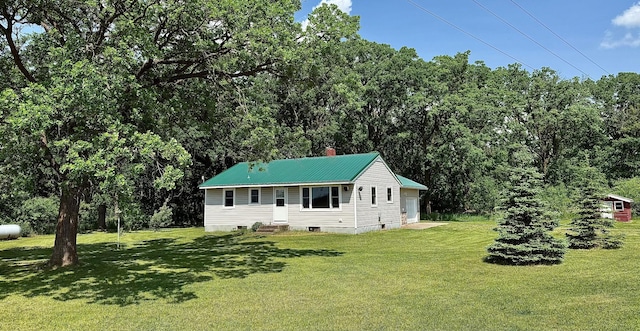 12900 350th Ave SE, Deer Park Twp, MN 56684 - ranch-style house featuring a front yard, entry steps, and a metal roof