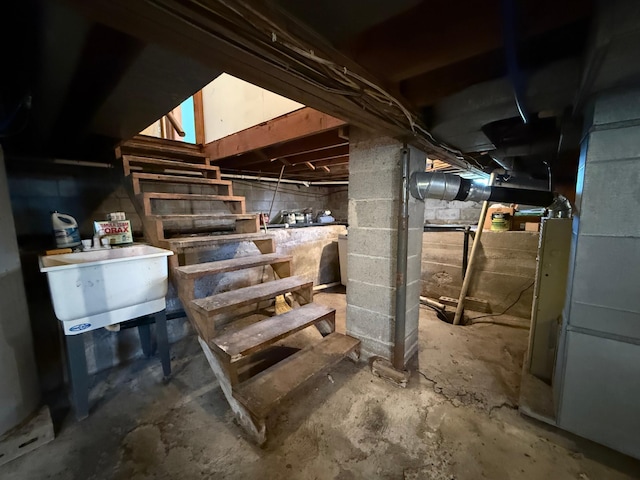 12900 350th Ave SE, Deer Park Twp, MN 56684 - unfinished basement featuring stairway and a sink