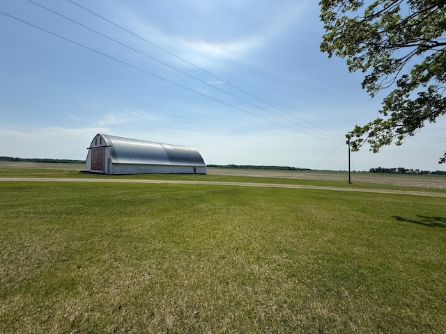 12900 350th Ave SE, Deer Park Twp, MN 56684 - view of green lawn with a barn and an outdoor structure