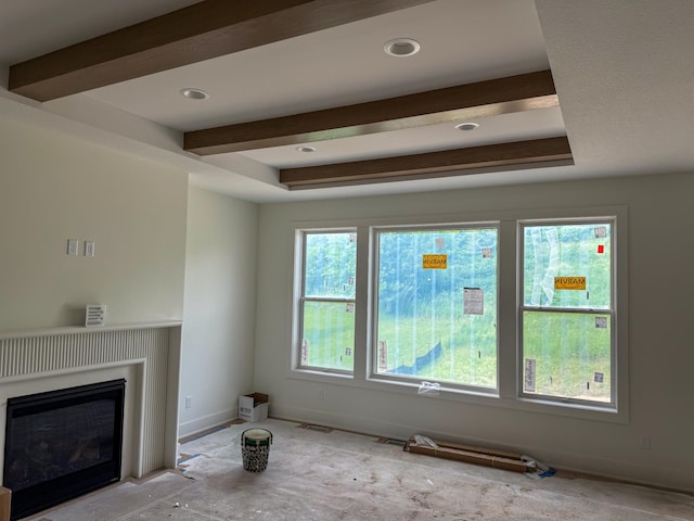 5260 Polaris Ln, Plymouth, MN 55446 - unfurnished living room featuring a glass covered fireplace and beamed ceiling