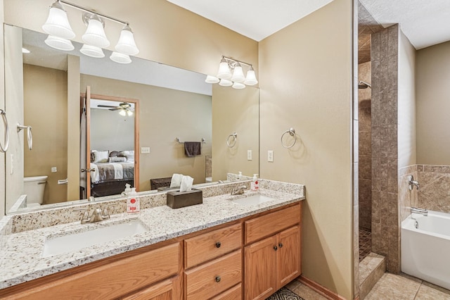 1364 Island View Dr, New Richmond, WI 54017 - ensuite bathroom featuring a ceiling fan, a garden tub, double vanity, tile patterned flooring, and a tile shower