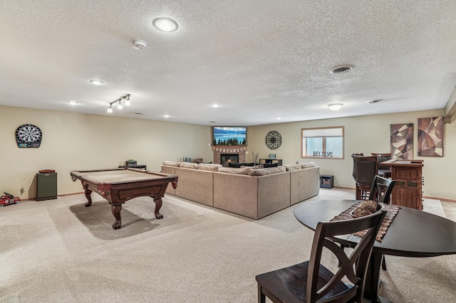 1364 Island View Dr, New Richmond, WI 54017 - game room with a textured ceiling, billiards table, a glass covered fireplace, light colored carpet, and recessed lighting