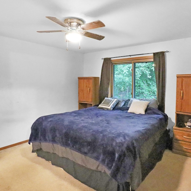 112 3rd St, Luck, WI 54853 - bedroom featuring carpet and a ceiling fan