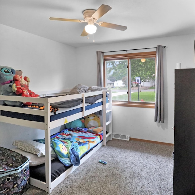 112 3rd St, Luck, WI 54853 - bedroom with carpet and ceiling fan