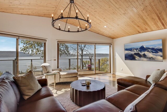 7 3rd St, Pepin, WI 54759 - living area featuring a chandelier, healthy amount of natural light, wood finished floors, wood ceiling, and high vaulted ceiling