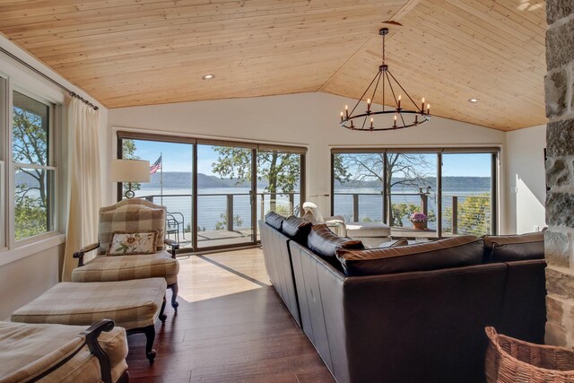 7 3rd St, Pepin, WI 54759 - living area with a chandelier, vaulted ceiling, a water view, wood ceiling, and wood finished floors