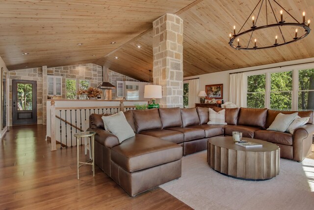 7 3rd St, Pepin, WI 54759 - living room featuring wooden ceiling, wood finished floors, a chandelier, healthy amount of natural light, and high vaulted ceiling