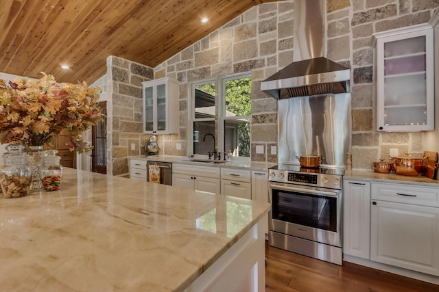7 3rd St, Pepin, WI 54759 - kitchen with appliances with stainless steel finishes, wall chimney exhaust hood, vaulted ceiling, wooden ceiling, and light stone counters