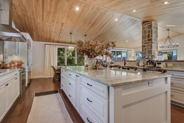 7 3rd St, Pepin, WI 54759 - kitchen featuring wall chimney range hood, wood ceiling, electric stove, a chandelier, and vaulted ceiling