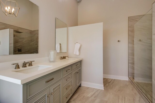 7 3rd St, Pepin, WI 54759 - full bathroom with double vanity, a walk in shower, a chandelier, and marble finish flooring