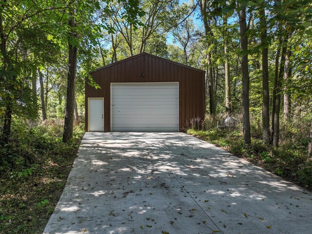 7 3rd St, Pepin, WI 54759 - detached garage featuring concrete driveway