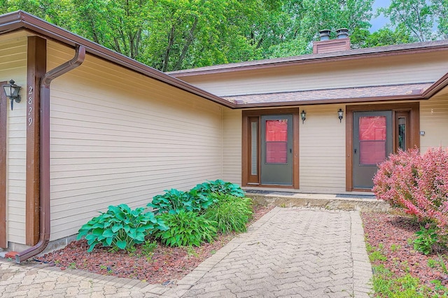 2833 Flag Ave N, New Hope, MN 55427 - entrance to property with a chimney