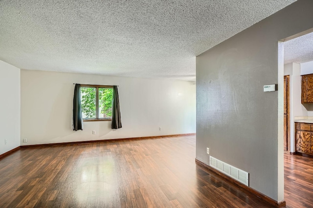 2833 Flag Ave N, New Hope, MN 55427 - empty room featuring wood finished floors and a textured ceiling