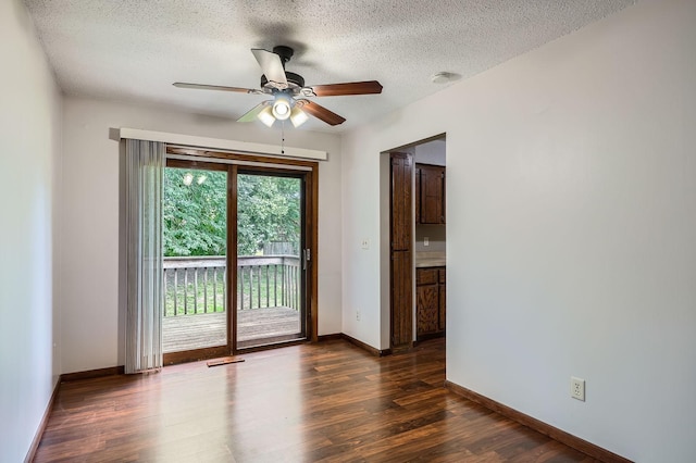 2833 Flag Ave N, New Hope, MN 55427 - empty room with a ceiling fan, a textured ceiling, dark wood-type flooring, and a smoke detector